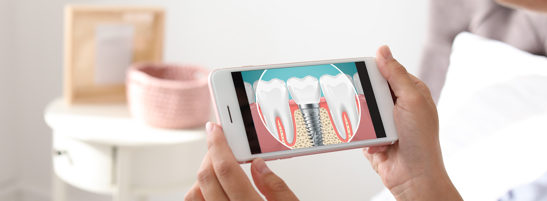 The image shows a person holding a smartphone displaying an advertisement with a toothbrush and toothpaste, set against a blurred background that suggests a domestic setting.
